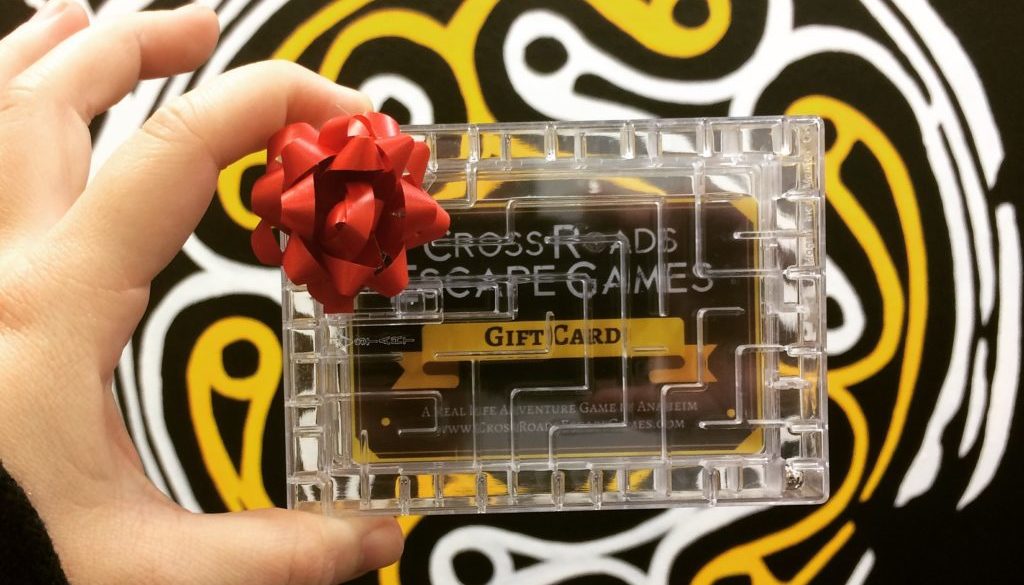 Cross Roads Escape Games Gift Card in puzzle case