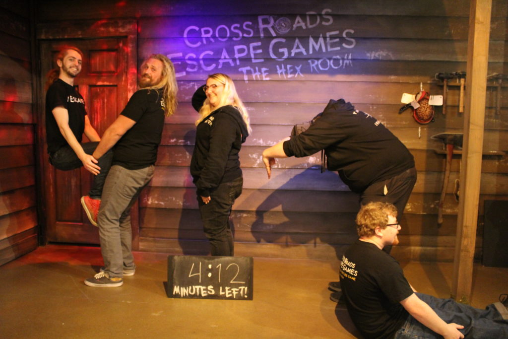 group poses - Cross Roads Escape Games